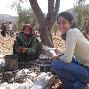 Julia Bacha filming during the olive harvest in the Occupied Palestinian Territories, 2005.
