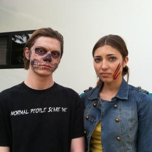 Actress Shelby Young poses with costar Evan Peters behind the scenes of American Horror Story