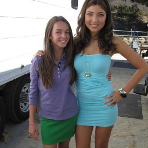 Actress Shelby Young poses with co-star Lexi Ainsworth on the set of their film 