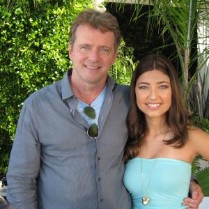 Actress Shelby Young poses with co-star Aidan Quinn on the set of their film 