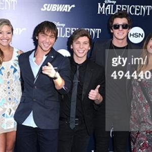 Tyler Case( pictured fourth from the left) and friends attending the world Premiere of Disney's 'Maleficent' at the El Captain Theatre in Hollywood, California on May 28, 2014