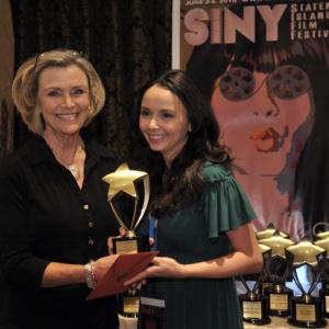 Patty McCormack presents Maria Rusolo with the Best Actress Award at the SINY Film Festival 2010 for her portrayal of Laura in WITHDRAWAL.