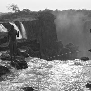 Filming fishermen at the top of Victoria Falls for 'The Smoke that Thunders'