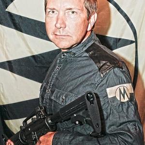 David Schifter as Monroe Militia officer