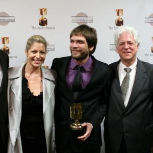 Presenters Tom McGrath and Danny Jacobs surround best commercial winners Gwynne Adik Uval Nathan and Ron Diamond Acme Filmworks