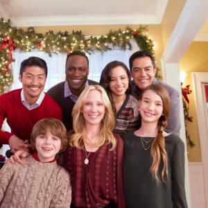 Ali Skovbye Griffin KaneAnne Heche Brian Tee Kevin Daniels and Carlos Gomez on the set of One Christmas Eve