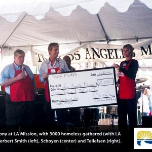 Donation from profits of the docudrama Living the Dream PHASE 7 of behavior study ceremony on 221206 at LA Mission with 3000 homeless gathered w business partners Schoyen Tellefsen and LA Missions CEO Herbert Smith wwwcanpeoplechangecom