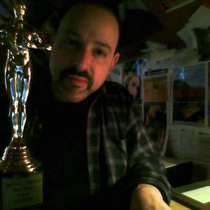 Me and my BEST FEATURE award for The Ascent at the 2013 Atlantic City Cinefest! Look at that shiny golden head