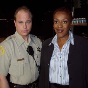 Dennis W. Hall with C.C.H. Pounder on the set of 