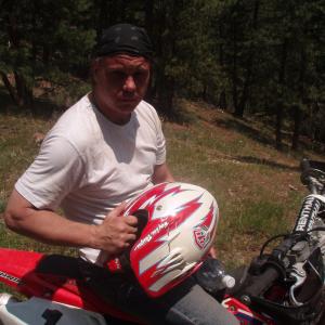 Dennis W. Hall motorcross riding in Colorada in the Rocky Mountains at 8600 feet.