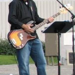 Steve playing his main axe, a 1979 Fender P-bass, summer of 2010.