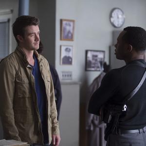 Still of Robert Buckley and Malcolm Goodwin in iZombie 2015