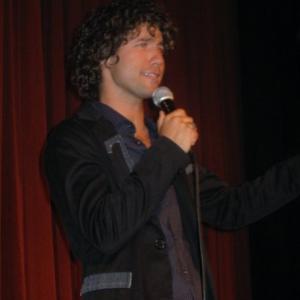 Foster on stage at The Comedy Store 2009