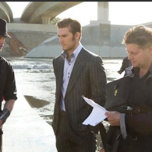 Brendan Miller and Alex Pettyfer with Director Andrew Niccol on the set of IN TIME