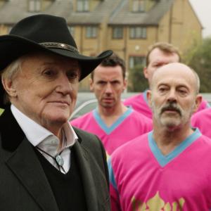 Still of Robert Vaughn and Keith Allen in The Magnificent Eleven (2013)