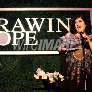 Presenting 2012 Point of Courage award at Drawing Hope International Gala in Beverly HIlls, CA.