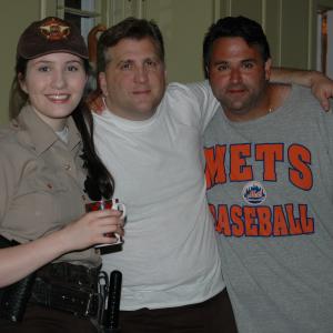 Producer Sam Borowski r flanked by actors Robin Anne Phipps Dee and Daniel Roebuck Sherriff Bobby on the set of REX