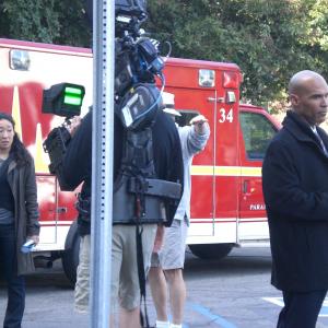 Darren Dupree Washington and Sandra Oh on set of Grey's Anatomy.