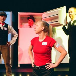 Kellie Waymire, Tom Elliott, Rebecca Avery and Kevin Fabian in a photo still from: An American Book Of The Dead, The Game Show by Paul Mullin for Circle X Theatre Company.