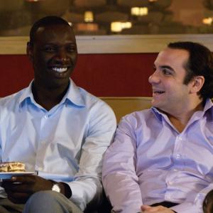 Still of Omar Sy and FranoisXavier Demaison in Tellement proches 2009