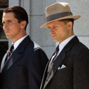Christian Bale as Melvin Purvis and Chandler Williams as Clyde Tolson Public Enemies 2009
