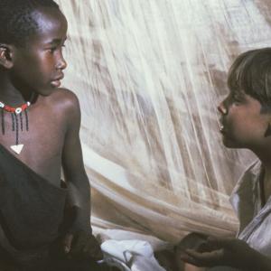 Still of Corey Carrier and Isaac Senteu Supeyo in The Young Indiana Jones Chronicles 1992