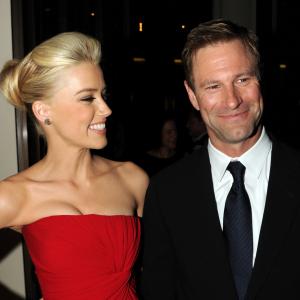 Aaron Eckhart and Amber Heard at event of Romo dienorastis (2011)