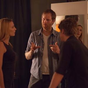 Mark discusses a scene with Andrew Francis and Jessica Harmon