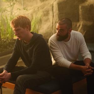 Still of Oscar Isaac and Domhnall Gleeson in Ex Machina (2015)
