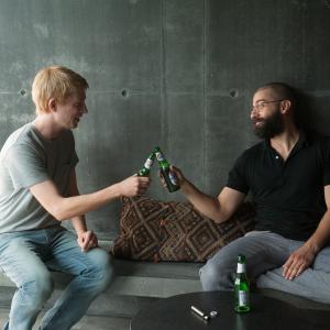 Still of Oscar Isaac and Domhnall Gleeson in Ex Machina (2015)
