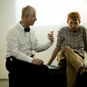 Richard Curtis and Domhnall Gleeson in Laiko tiltas (2013)