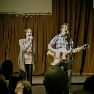 Cooper and his sister Gatlin performing