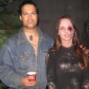 ZOMBIE NIGHT II (2006)-Behind-The-Screams Horror Movie Cast/Crew pix Actor: Tony 'Tex' Watt shown here onset w/ cast and actress: Angela Faulkner [Vixen Highway 2006 (2010)] PrimalFilms.com's ZOMBIE NIGHT 2 [aka AWAKENING]; Watt filmed FRANKENPIMP , between acting in this movie and Primal Film's REEL ZOMBIES...One-eyed Zombie Angie, was then cast as one of the lead actresses (Ingrid) in TWI Studio's VIXEN HIGHWAY 2006 in 2010. Copyright 2005, Tony Watt All Rights Reserved