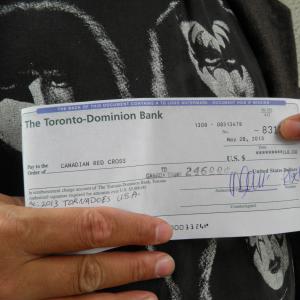 FILMMAKER/ACTOR/CARTTONIST TONY 'TEX' WATT HOLDING RED CROSS $246.00USD MONEY ORDER' FOR '2013 USA MIDWEST TORNADO FUND RELIEF' ON BEHALF OF HIS FACEBOOK & JANGO GROUP MEMBERS FROM THE CONTROVERSIAL 'CHOKE THE CROAK'