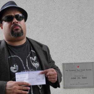 FILMMAKERACTORCARTTONIST TONY TEX WATT HOLDING RED CROSS 24600USD MONEY ORDER FOR 2013 USA MIDWEST TORNADO FUND RELIEF ON BEHALF OF HIS FACEBOOK  JANGO GROUP MEMBERS FROM THE CONTROVERSIAL CHOKE THE CROAK CONTEST CO HTTPTONYWATTCOM