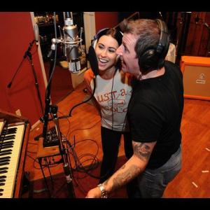 LAS VEGAS NV  JUNE 28 Sarah Spiegel and Louis Prima Jr during a studio recording at The Tone Factory Recording Studios in Las Vegas Nevada