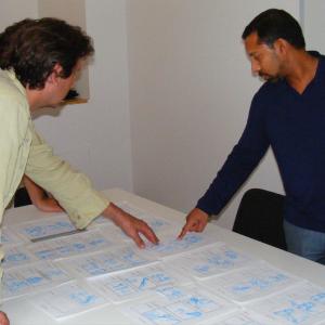 Stephen Lategan reviews storyboards for a television project 2013