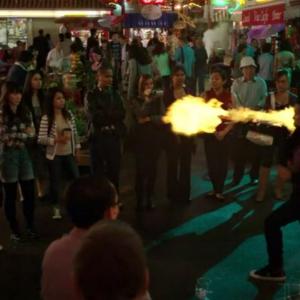 Watching a magic act take place on a Hong Kong street...in AGENTS OF S.H.I.E.L.D. - Episode 1.5: 