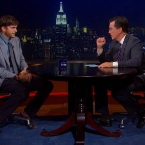 Still of Ashton Kutcher and Stephen Colbert in The Colbert Report 2005