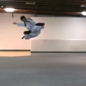 Rich throws a jump flying side kick