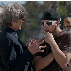 Discussing a scene with Eric Roberts.