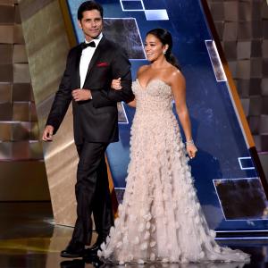 John Stamos and Gina Rodriguez at event of The 67th Primetime Emmy Awards (2015)