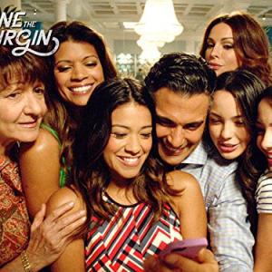 Still of Ivonne Coll, Andrea Navedo, Gina Rodriguez, Veronica Merrell and Vanessa Merrell in Jane the Virgin (2014)
