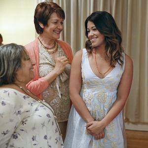 Still of Ivonne Coll and Gina Rodriguez in Jane the Virgin 2014