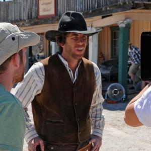Clint James and director Jonathan Taylor on the set of Four Minutes till Noon Clint plays The Veteran Shot on location in Gammons Gulch Located north of Benson Arizona