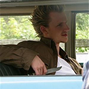 Chad Rook as the amateur kidnapper Spike in the film Replay