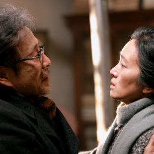 Still of Li Gong and Daoming Chen in Gui lai (2014)