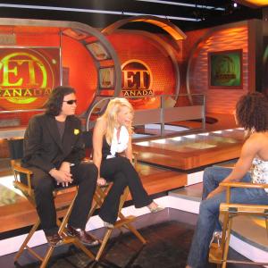 Gene Simmons and Carrie Keagan on the set of ET Canada