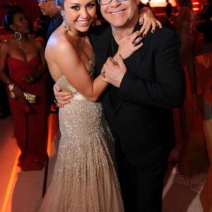 Elton John and Miley Cyrus at event of The 82nd Annual Academy Awards 2010