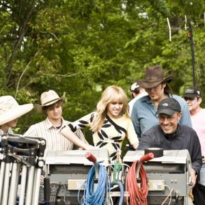 Still of Billy Ray Cyrus Peter Chelsom Tricia Ronten Miley Cyrus and Jason Earles in Hana Montana filmas 2009
